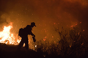 fighting a wildfire at night